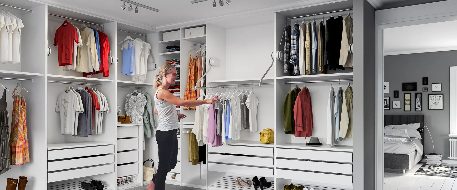 Maximising storage in your walk-in wardrobe with an adjustable clothes rail